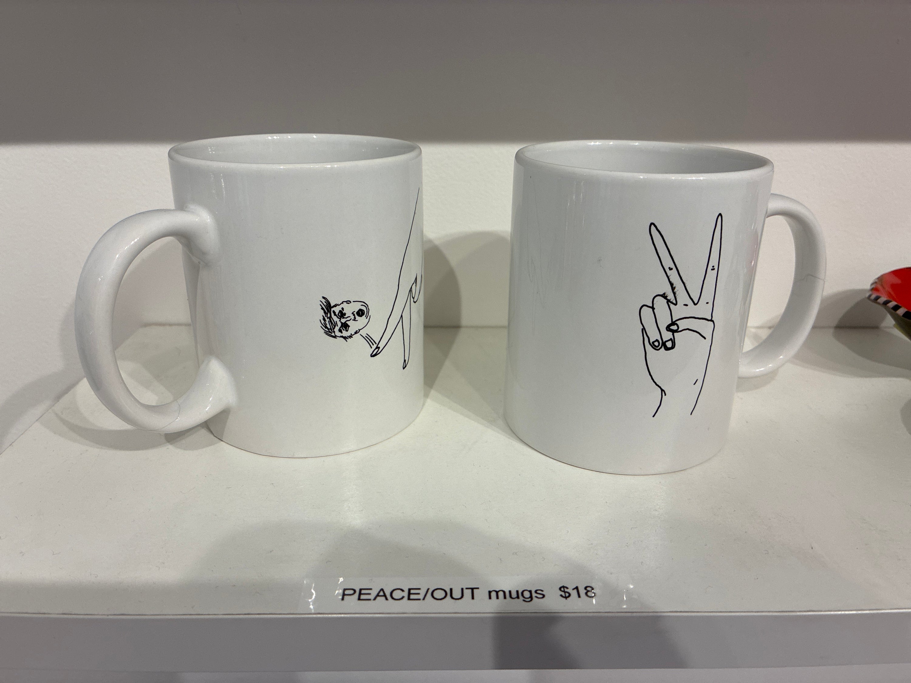 PEACE/OUT mugs