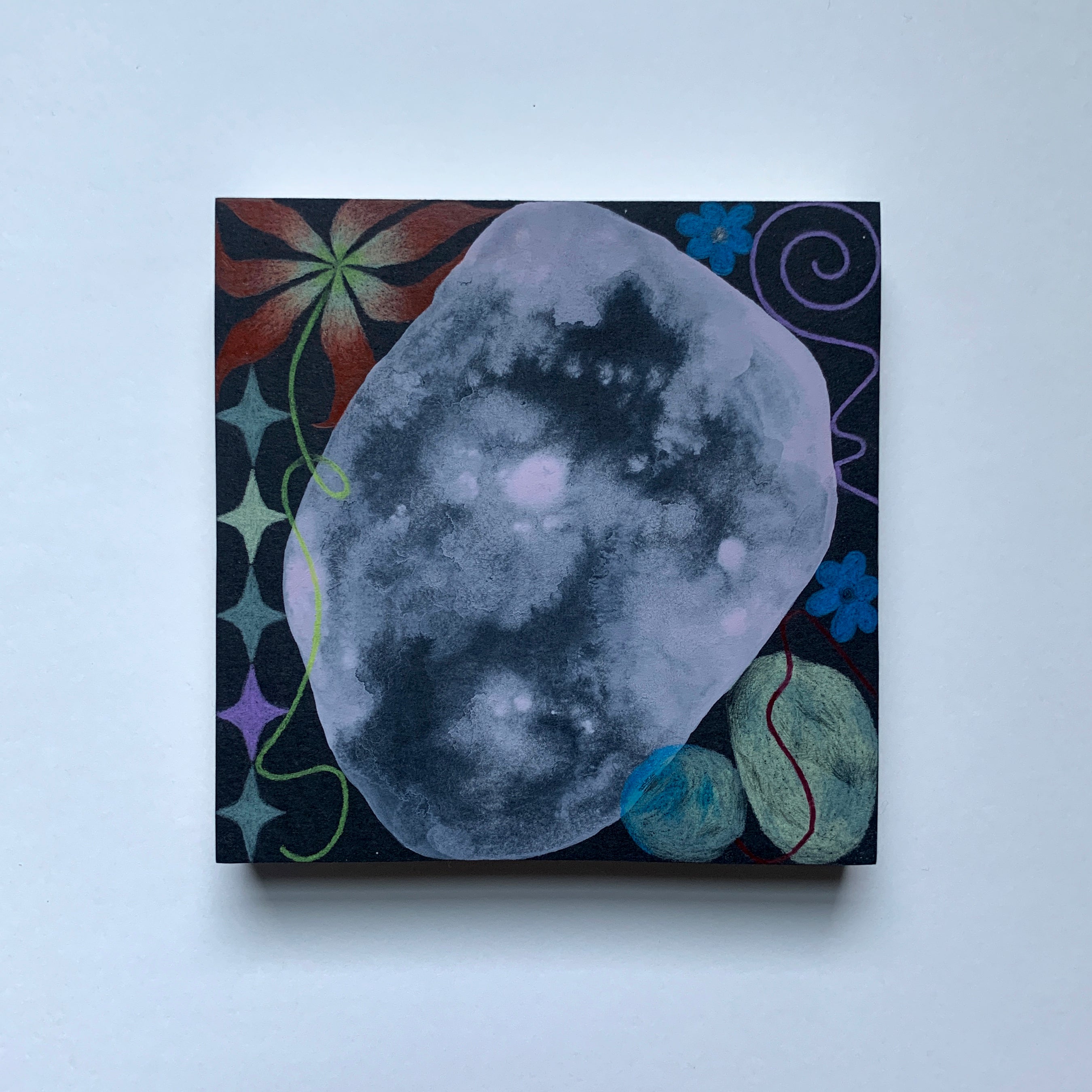 Canvas print of a moon with decorative elements on a white background