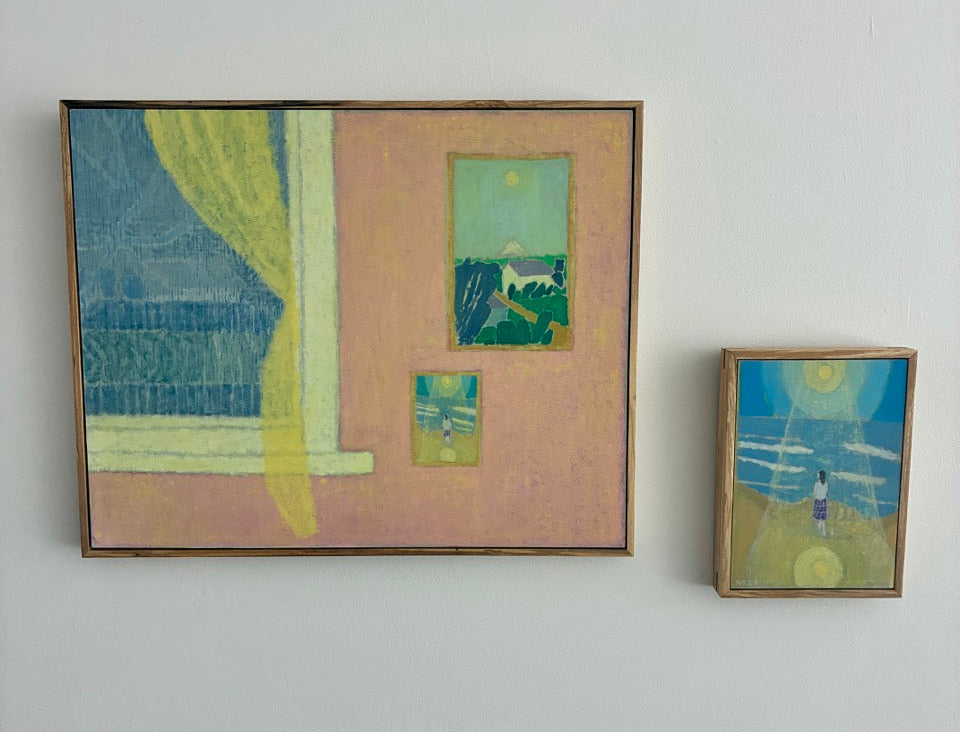 Two framed abstract artworks on a plain wall