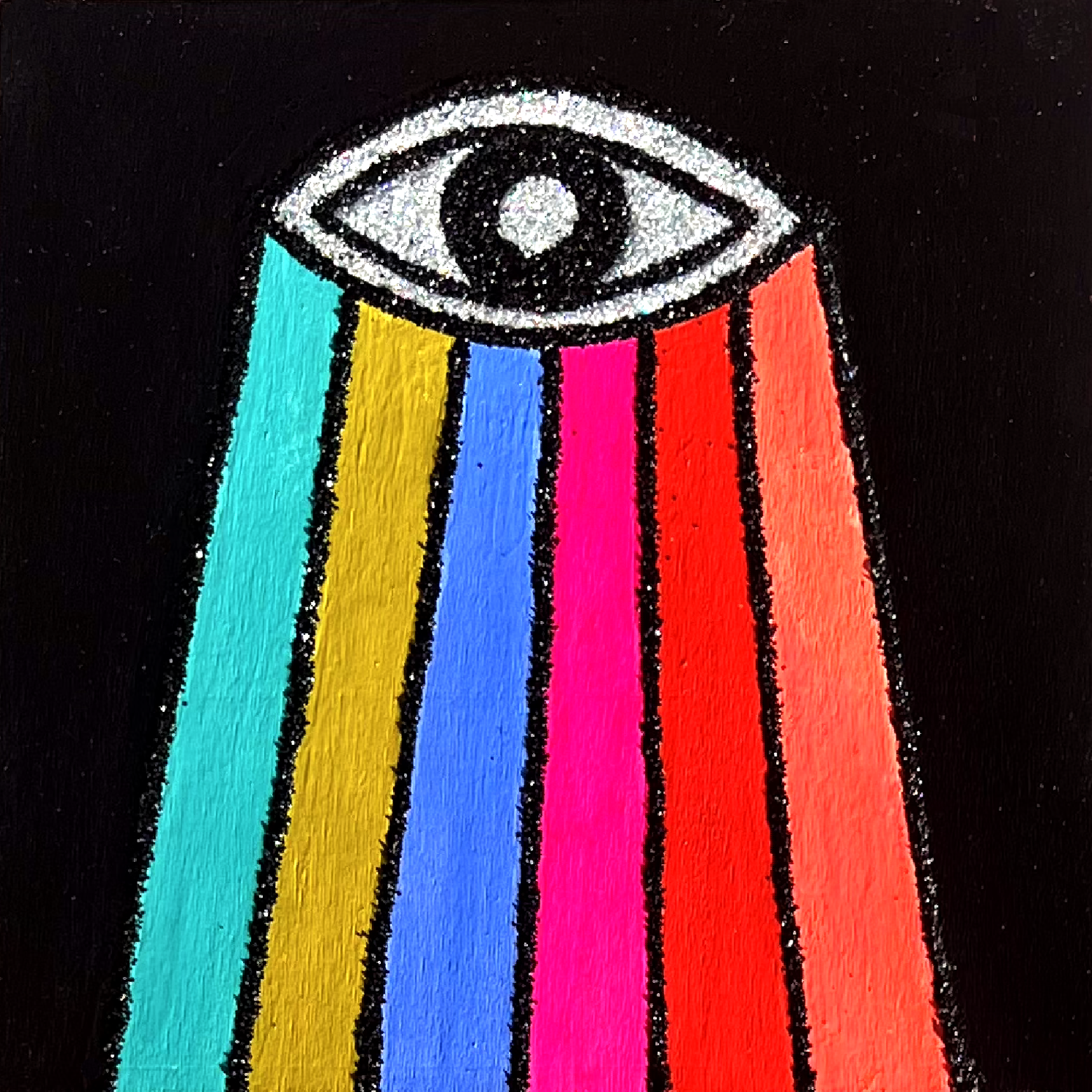 Eye with rainbow beams on a black background