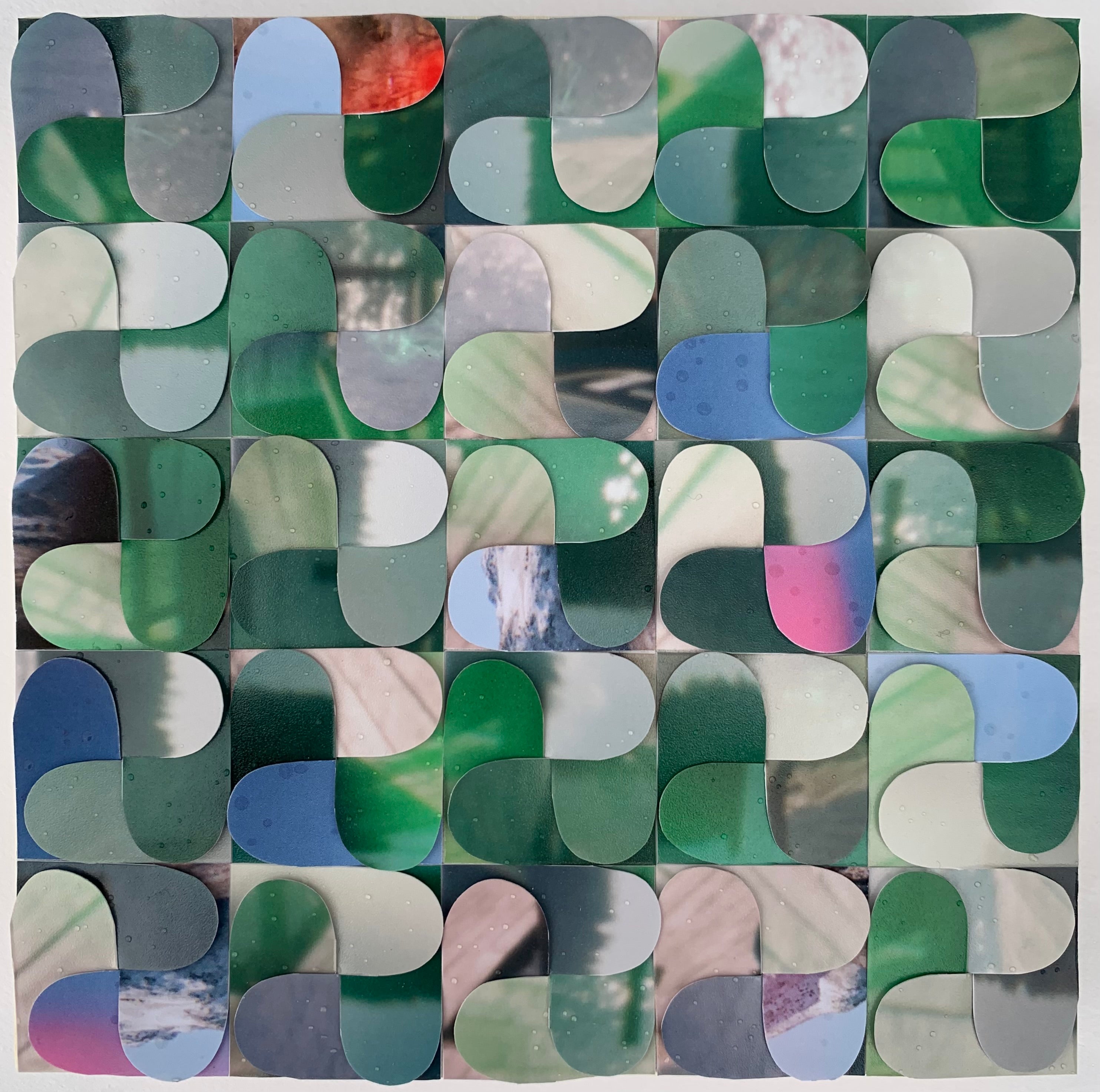 Mosaic pattern with green, blue, and gray tiles