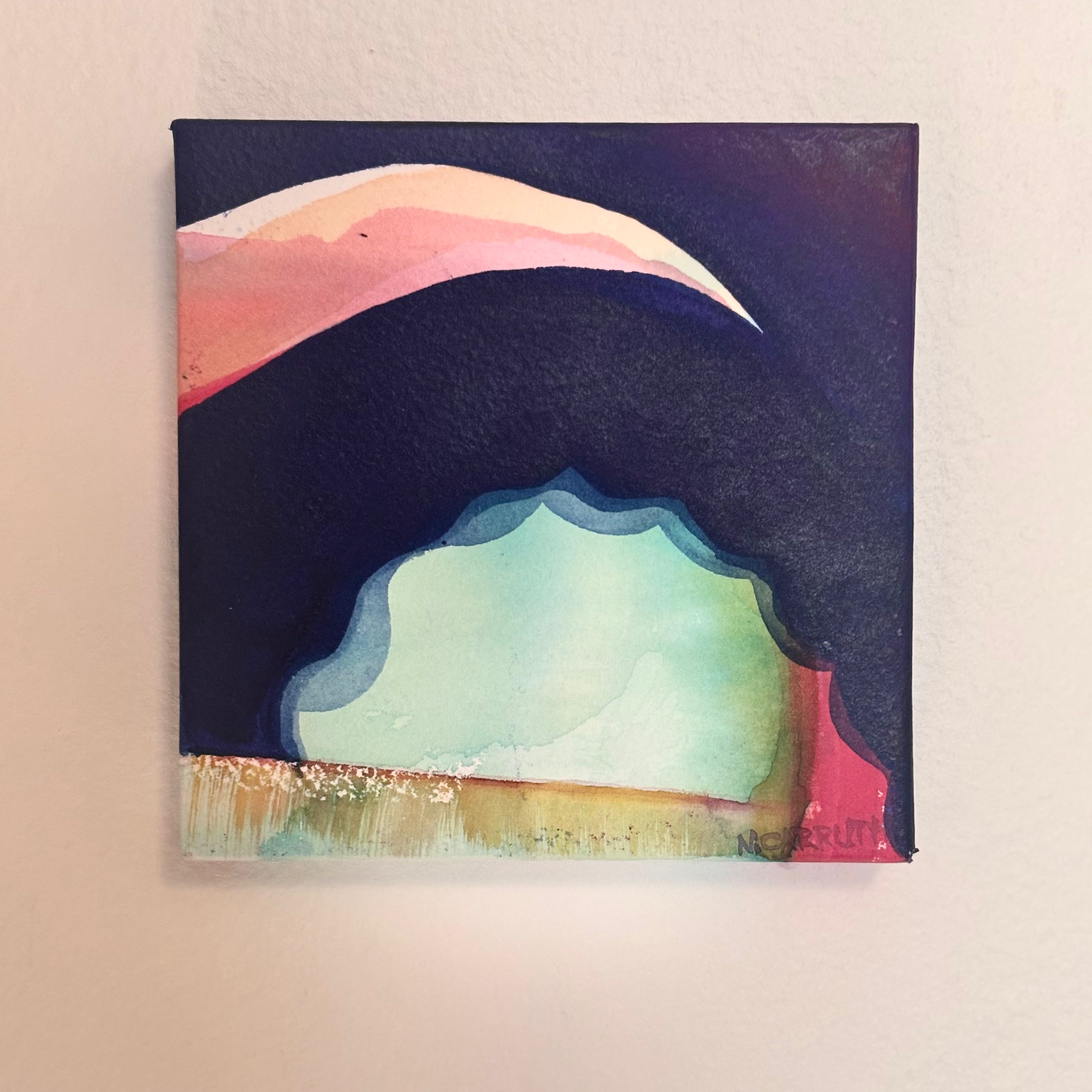 Abstract painting of a landscape with pink, blue, and green hues on a beige background