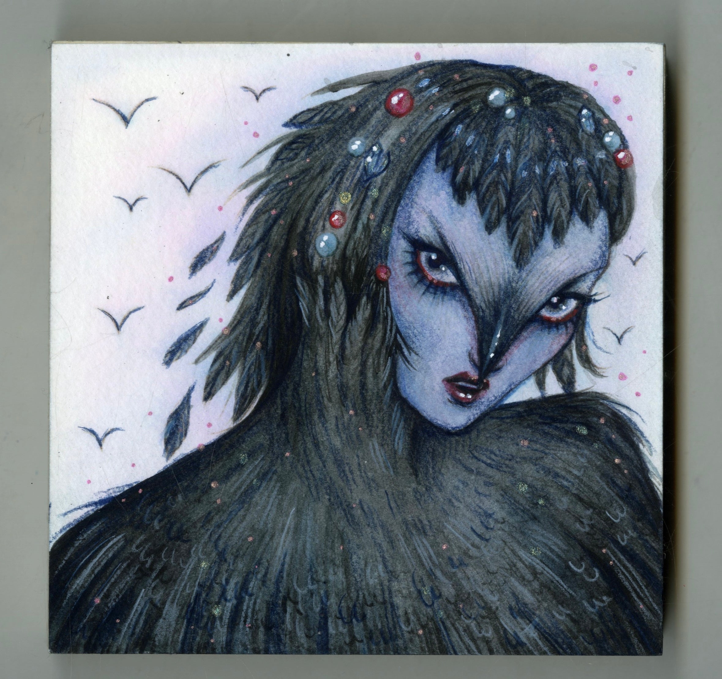 Artistic depiction of a fantasy character with dark hair and blue skin, surrounded by ravens.