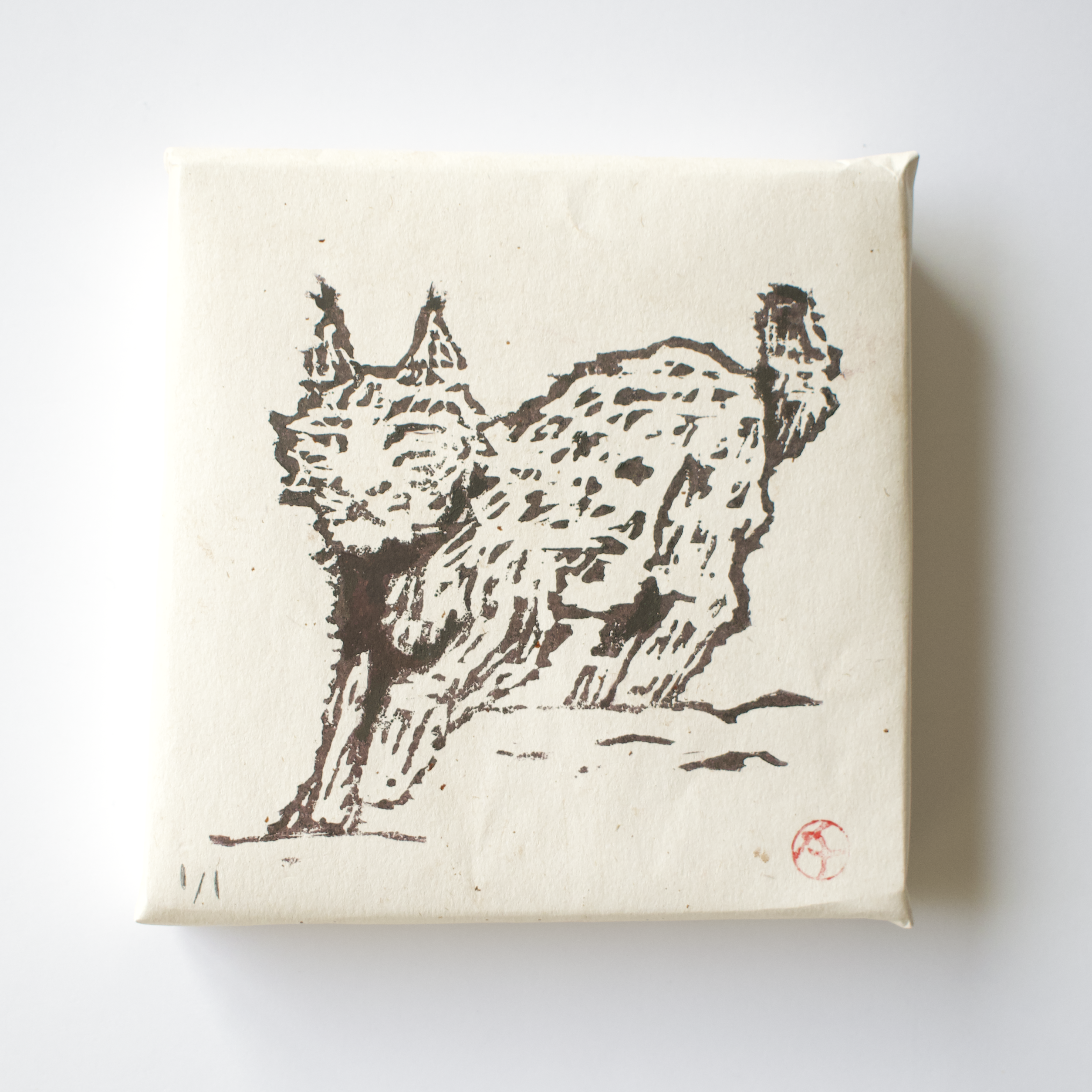 Canvas print with a black and white illustration of a lynx on a beige background