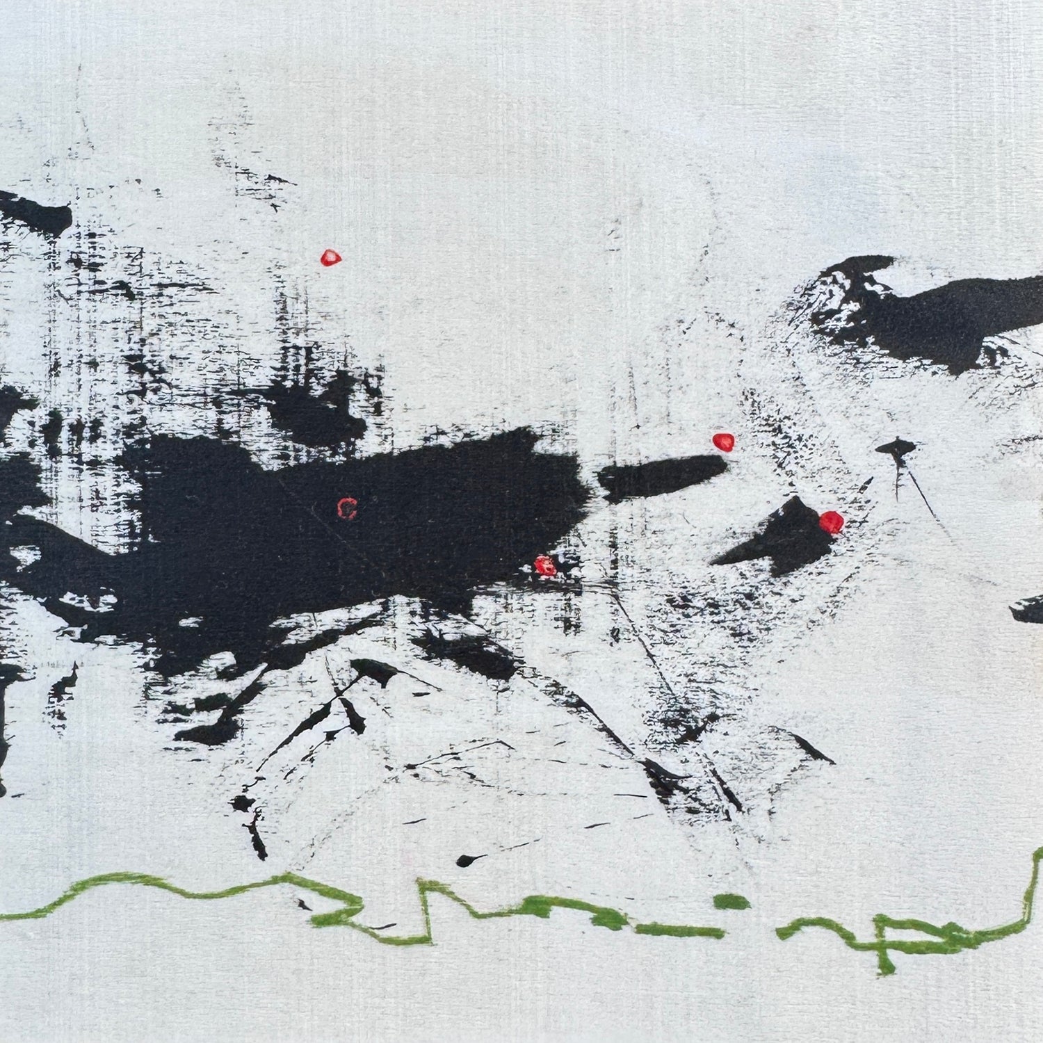 Abstract art with black and red brush strokes on a white background