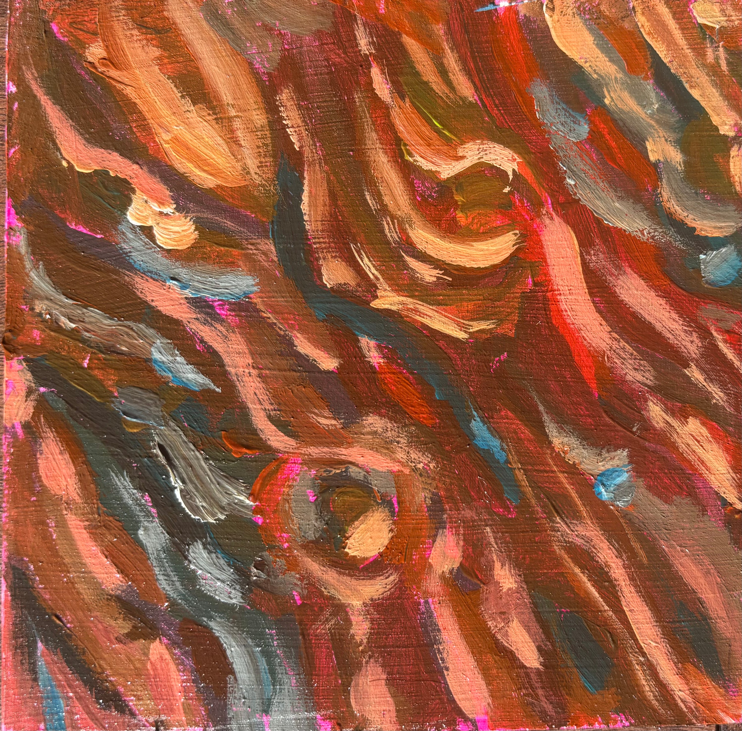 Abstract painting with swirling colors on a textured surface