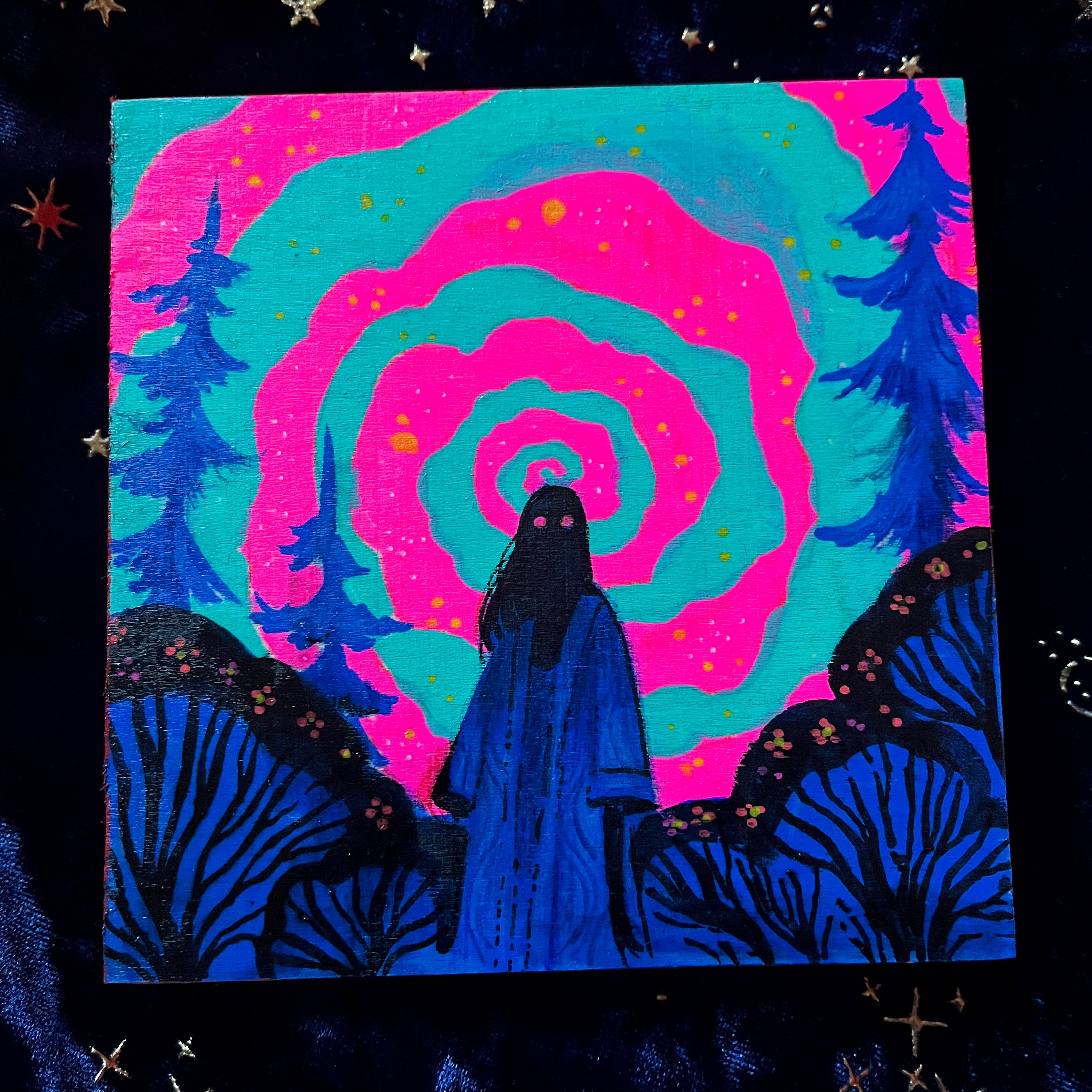 Artistic depiction of a figure in a blue robe with a spiral design and trees in the background.