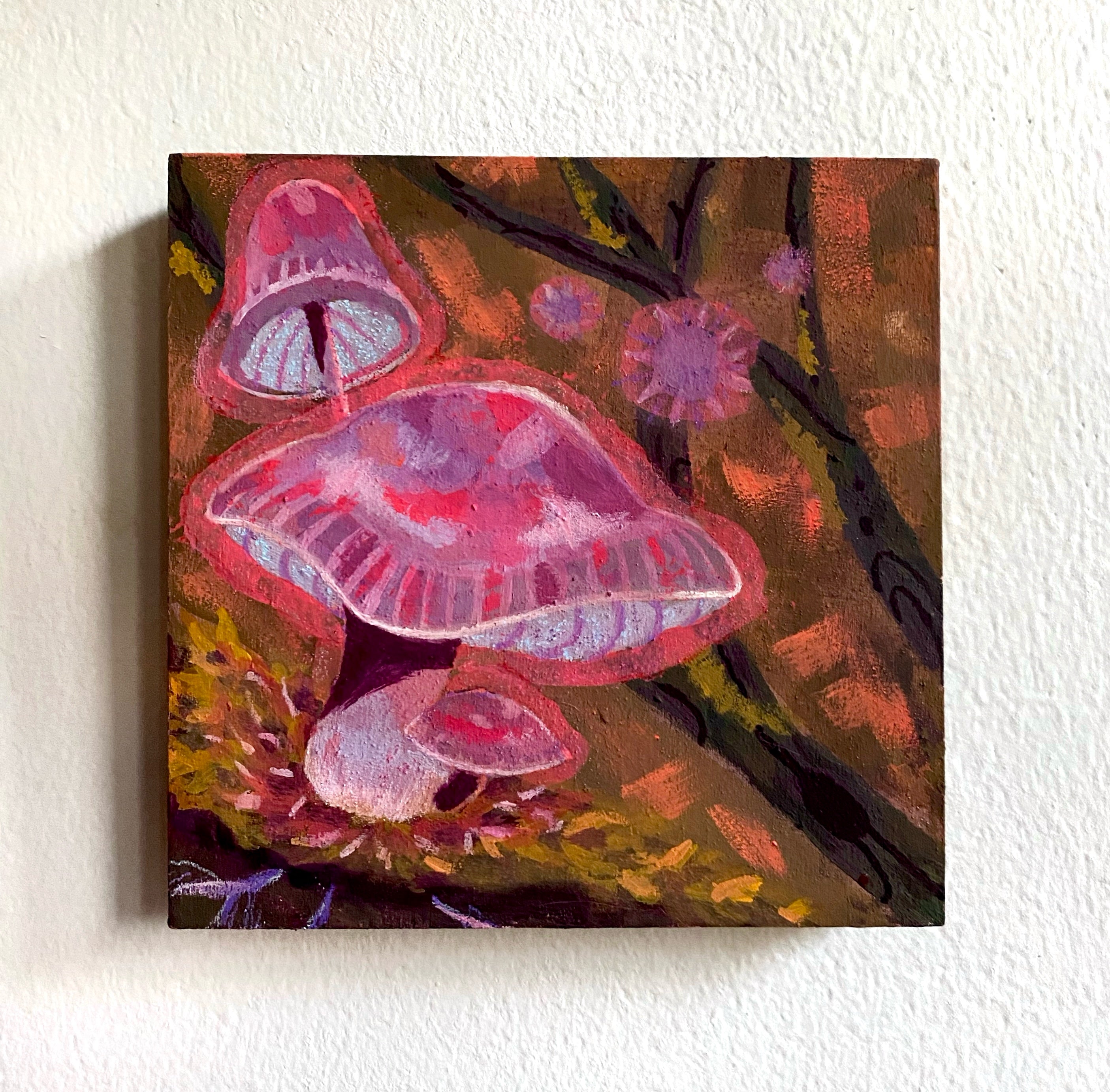 Painting of pink mushrooms on a wooden panel