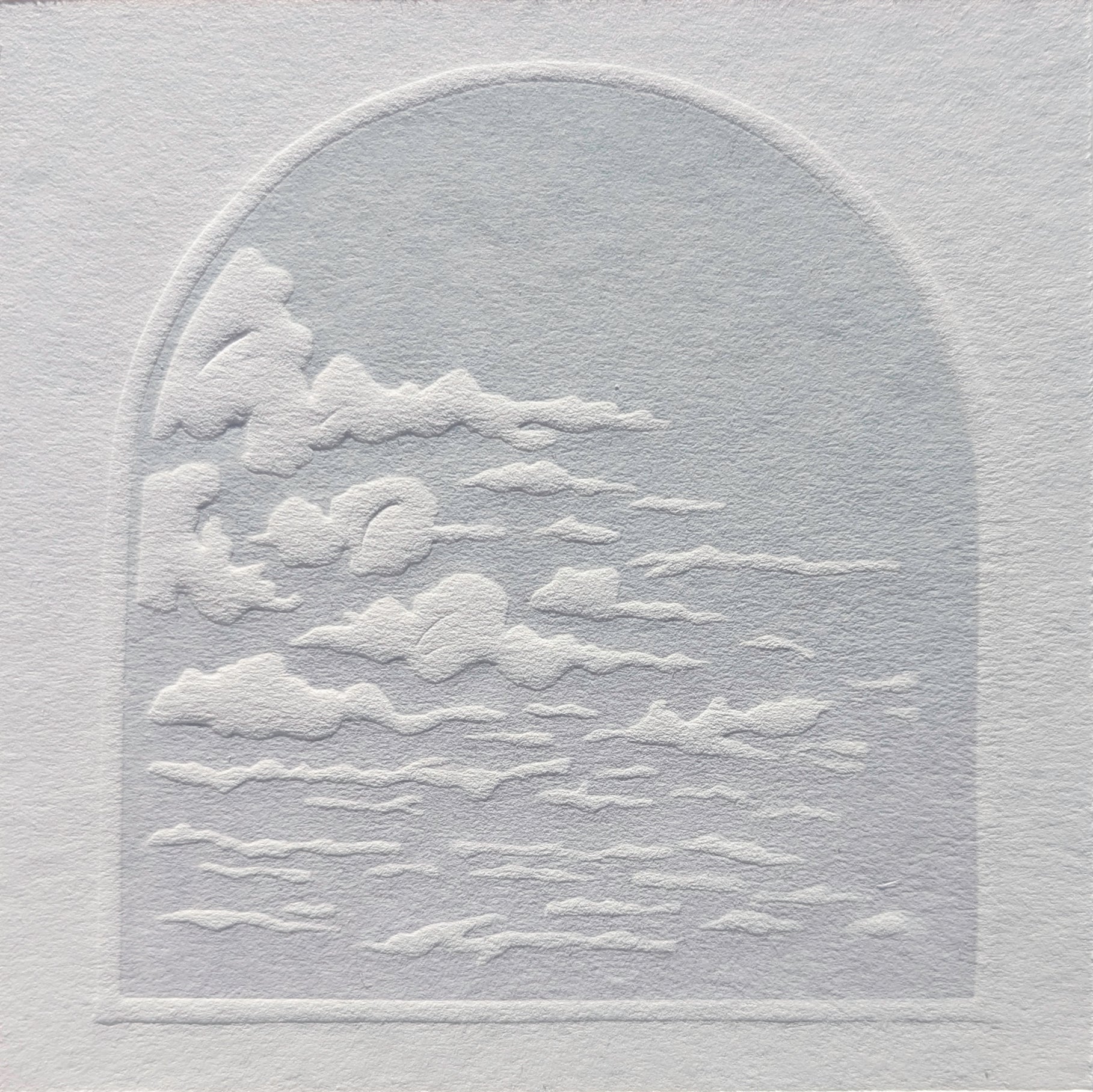 Textured paper with embossed clouds and a moon.