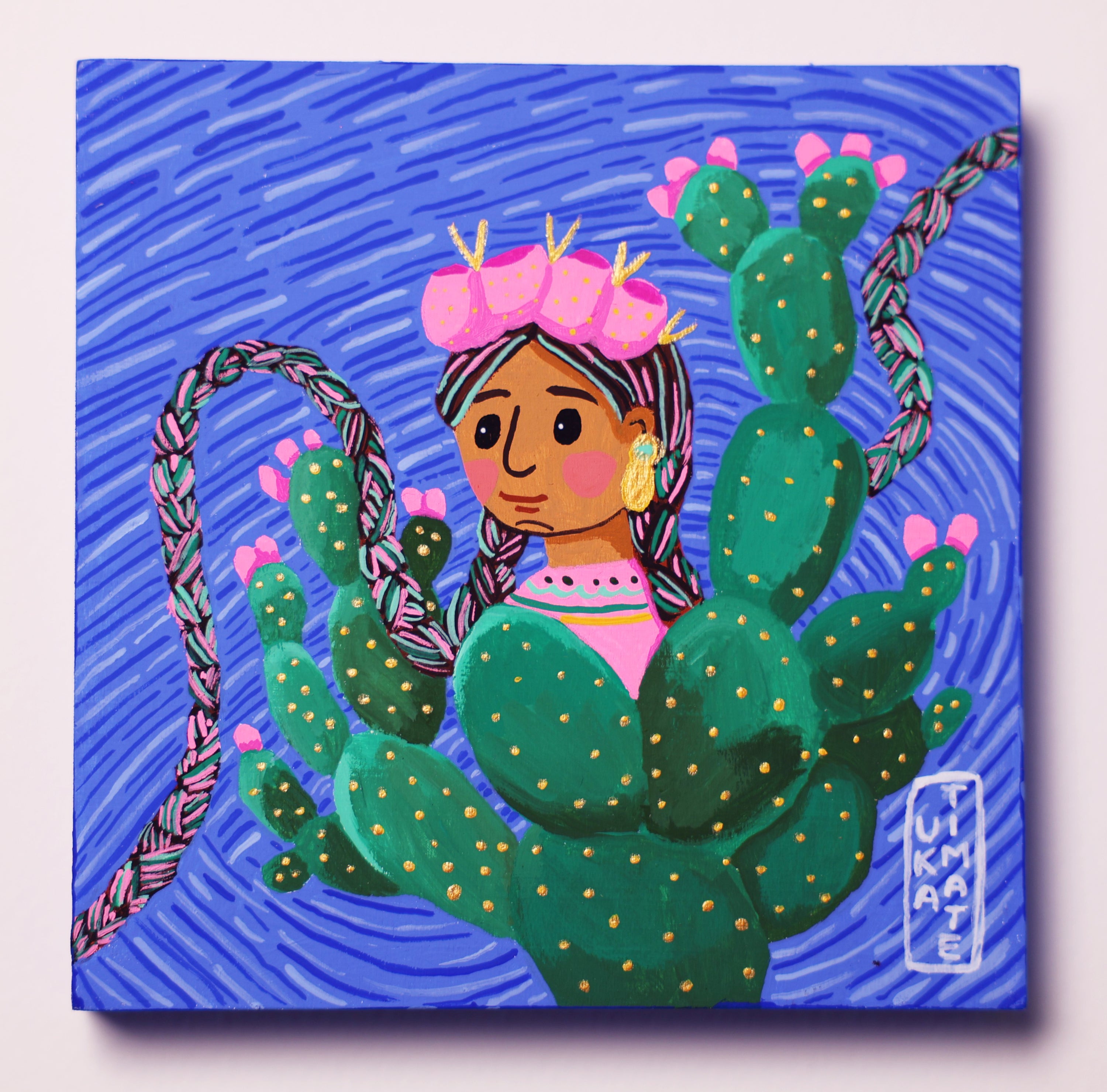 Illustration of a girl surrounded by cacti with a blue background
