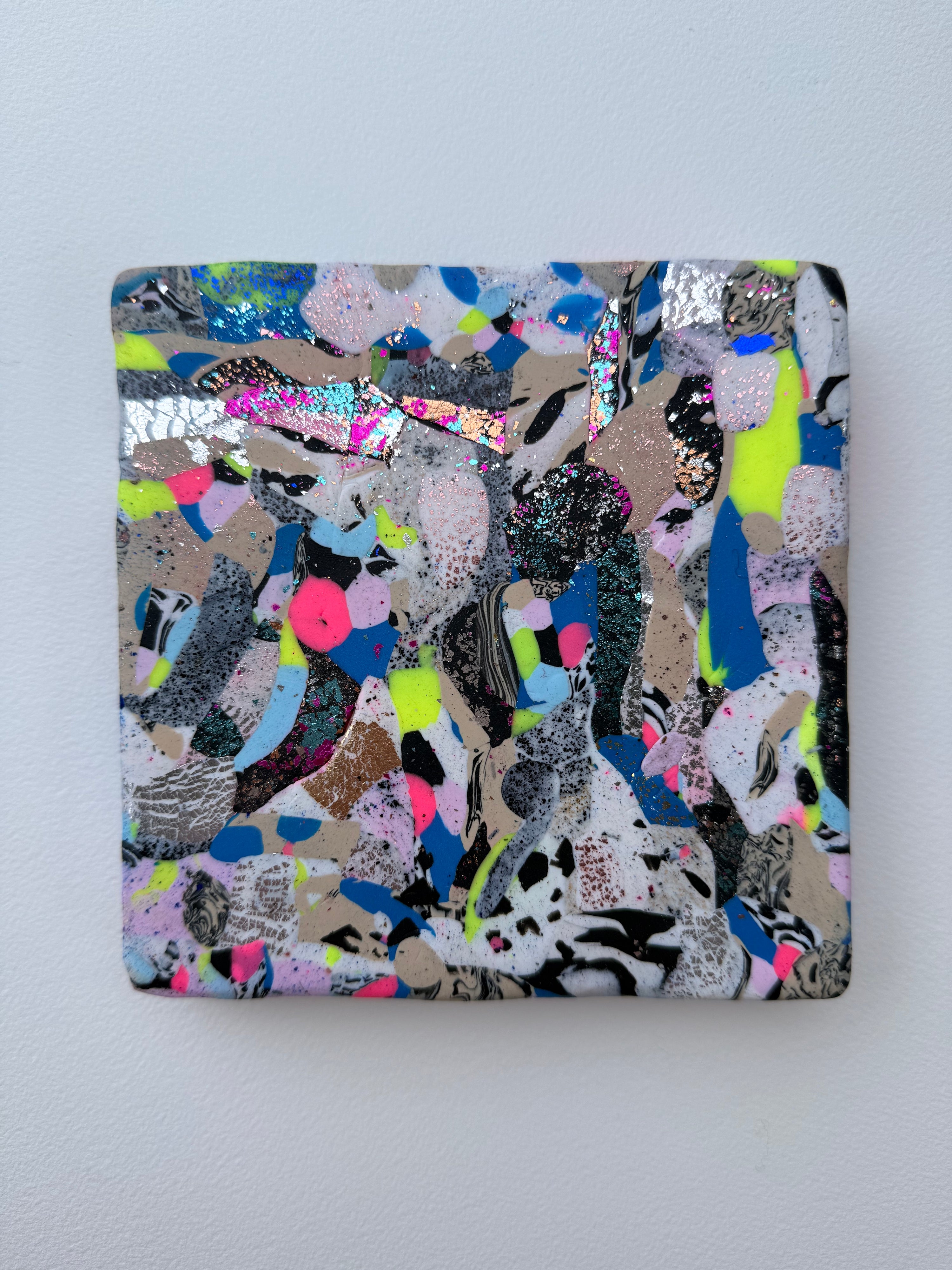 Colorful abstract patterned case on a light gray background